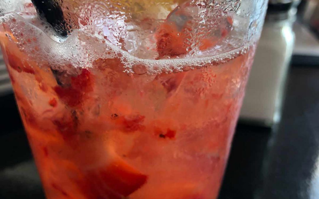 Glass of strawberry lemonade
